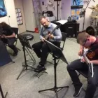 Unternehmen 4 Bild JS ROCKGITARRE Schulen & Fortbildung am Stuttgart BW