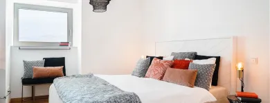 Unternehmen 83 Bild IRIS BAUMANN - IMMOBILIENMAKLER RHEINAUHAFEN KÖLN Raumausstatter, Innenausstatter am Köln NW